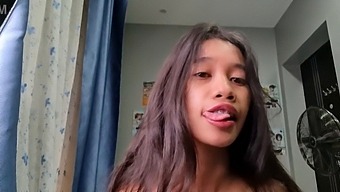 Petite Asian Woman Engaging In Sexual Activity
